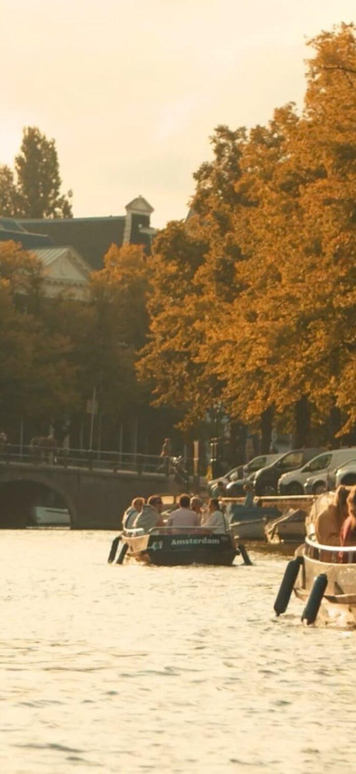 Mokumboot boats on the canal in the autumn sun